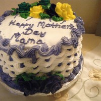 Mother's Day Cake Mother's Day cake with yellow, green & violet royal icing flowers