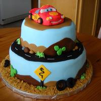 Cars Cake This cake was made for a friends little boy who turned 4. Inspired by other similar cakes on CC! The car was made of gumpaste - which I&#...
