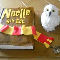 Harry Potter Book cake for my niece turning 9.Hedwig (owl) is rice krispies detailed in fondant.Glasses are from her halloween costume.Inspired by many...