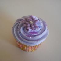Purple Cupcakes Fondant flower, and purple sugar added for sparkle!
