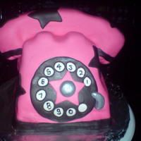 Telephone Cake I made this phone when I was working in a call center for treat day it even has a cord that i made from black licorish