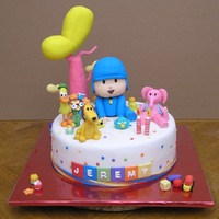 2Nd Birthday Boy Vanilla Cake with Dulce de Leche filing. Al the decorations are in Gum paste and RKT.