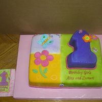 Twin Girls Cake A yellow cake with chocolate and vanilla pudding filling, covered in Fondant and gumpaste decorations. Fondant was airbrushed. The #1 is a...
