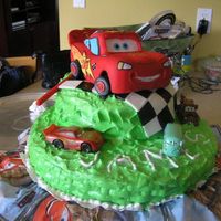 P7090065.jpg I made this cake with a merengue cover and the car was made out of Gum Paste.