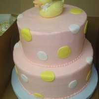 Baby Shower Duck pink and yellow polka dot theme with ducks. Hand made gum paste duck and fondant polka dots on buttercream icing