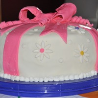 Flower Cake My second fondant cake ever! I made this cake as a gift for a birthday party. It is yellow cake with buttercream icing covered in...