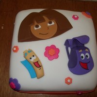 Dora The Explorer Cake Dora cake for my niece. Dora, Map, and Backpack made from fondant.