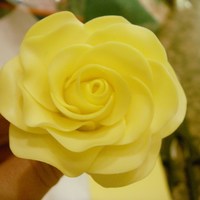 Yellow Gumpaste/choc. Modeling Clay Rose One of the yellow Gumpaste/Modeling Clay Roses for my skull wars cake. I like to combine gumpaste with chocolate modeling clay for roses...