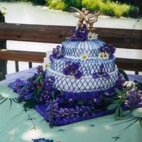 Purple And Gold This is actually the first wedding cake I did when I worked in Alaska. My sister Abby made the topper. Ukrainian Poppyseed cake with cream...
