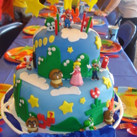 Mario Cake This was my first fondant cake. I made it for my son's 9th birthday.