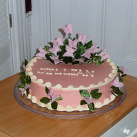 Baby Shower Buttercream frosting, silk butterfly confetti pieced together with beads on floral wire.