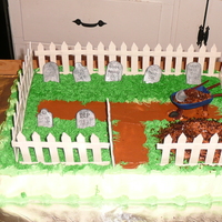 Graveyard Birthday Cake I made this for a 40th birthday. I used Sculpey for the fence, gravestones and wheel barrow.