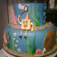 Spongebob Squarepants My son's second birthday cake. He loves Spongebob! All decorations are fondant.