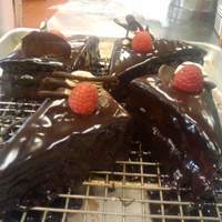 Rubies Torte School Final flourless chocolate almond cake layered with raspberry gelee, raspberry ganache, and covered in cocoa gelee, with fresh rasperry and...