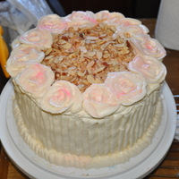 Italian Cream Cake For Maria Italian Cream Cake with pecans/walnuts and coconut baked in. Cream cheese icing, three layers with toasted coconut and almond on top, cream...