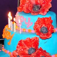 Zephyr's 7Th Bday Cake these are gumpaste poppies on my daughters 7th birthday cake, its not my best fondant work cause I was in a huge rush, and the poppies...