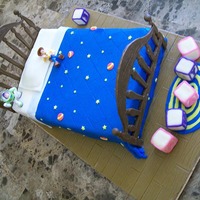 Toy Story I made this cake last year for a three year old's birthday. It is a chocolate caked filled with strawberry, frosted with buttercream...