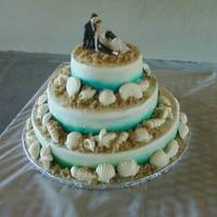 Beach Wedding This is my first wedding cake & first time air brushing.Vanilla cake with buttercream icing. Aqua airbrushed boarders. White chocolate...