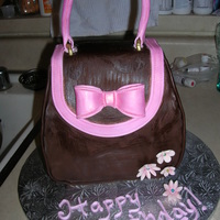 Second Purse Cake.. This was my second purse cake and I liked this one much better than the first... got the cake idea from Confetti Cakes Book Elisa Strauss