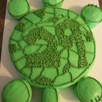 Turtle, 29 My cousin was turning 29 so I threw this together with what I had at the house. Buttercream, round cake, cupcakes cut to fit arms, legs,...