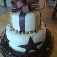 Farm Chic Customer provided "twigs" and stars all of which are not edible. Thanks to Duff grafiti for the gold color! This cake was made...