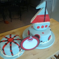 Sailboat I made this cake to match the invite. Sailboat made from RKT.