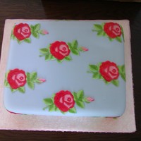 Cath Kidston Cake Fruit cake covered in marzipan & icing with floral cut outs & hand painted