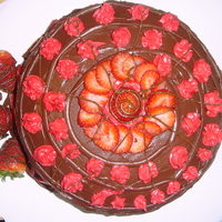 Strawberry Birthday This was for another friend's birthday. It's a strawberry cake iced inchocolate frosting with whole and sliced strawberries all...