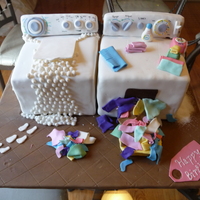Washing Machine And Dryer This cake was for a mother who's kids said that all she does all day is laundry so the father ordered this cake. Because of allergies...