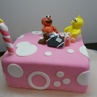Sesame Street Birthday Made for my baby on her first birthday. Everything including candle is fondant or gumpaste except the safety pin which is gold wire....