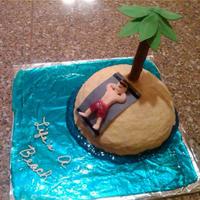 Life's A Beach Basic yellow butter cake w/ buttercream frosting. Pure cane sugar for "sand". Wrapped a tootsie roll around a dowel rod for the...