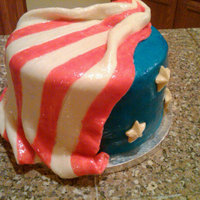 Glory Three layer cake (red, white, blue layers). Covered in blue fondant brushed with blue glitter gel for shine. White fondant "flag&quot...