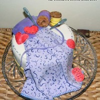 Sewing Cake A Sewing themed cake for a girl who loves the colour purple. Fondant covered purple cake. Spindles and needles made of gumpaste.