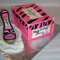 Jessica Simpson Shoe Cake Front This is a Jessica Simpson Shoe and Box. It was for a friend's daughters 25 birthday. I used rice crispy treats for the cork heel and...