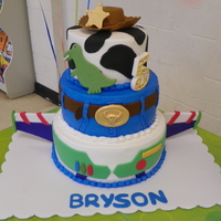 Toy Story Cake This is a cake I made for my 5yr old. I combined several cakes I viewed on cakecentral. It is iced in buttercream and decorations are in...