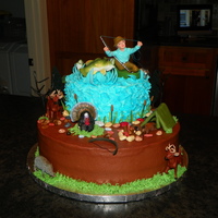 Hunting / Fishing Cake This is one of the first cakes I have ever chose to put on several items that were not edible.