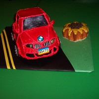 Gg Wanted A Red Bmw For Her Birthday! This is several layers of yellow cake carved to shape with buttercream fondant and Thin Mint cookies for tires.