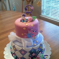 Abby Cadabby Birthday Cake Chocolate and Vanilla Marble Cake with French Vanilla BC, covered with Satin Ice Fondant. Gumpaste and fondant accents. Pearl dust and...