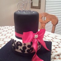Black, White And Hot Pink Bridal Shower Cake Entirely Edible with exception of Crystal Monogram Topper, black and hot pink ribbon and pearl/crystal bow bling. Satin and tulle-covered...