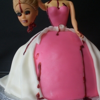 Headless Doll I had lots of fun making this cake! A doll cake with a twist, I used flesh colored fondant to cover the top of the neck and made a fondant...