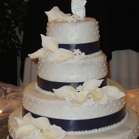 Calla Lilies This was for a friends wedding the cake is yellow cake with all buttercream. The Calla Lilies and Stephanotis are made from a gumpaste/...