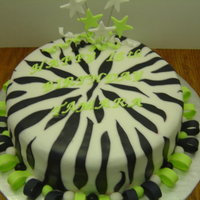 Zebra Birthday The Birthday girl requested a Zebra cake with Lime Green letters. This is a chocolate cake with cream cheese filling. The outside is...