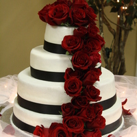 Daughters Wedding Cake This was the cake I made for my daughters wedding. Two layers were chocolate for the bride and 2 layers were yellow for the groom. It was...