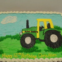 John Deere Birthday boy requested a John Deere cookie cake. Chocolate chip cookie cake covered and decorated with butter cream icing.