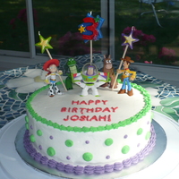 Toy Story Birthday Cake This is my first cake for a party. It was for my son's 3rd birthday. It is a chocolate cake with buttercream.