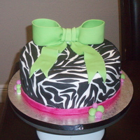 My 1St Zebra Cake This was made for a friends daughter, she turned 15.We did have fun finding "hidden" objects in the stripes. :)