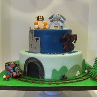 Thomas And Spiderman Cake was chocolate and vanilla with vanilla BC filling and covered with marshmallow fondant. Figurines were gumpaste and accents were all...