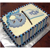Nautical Baby Bib Shower Cake I made this cake for a sailing-themed baby shower. Icing is buttercream; the bib, sailboats, and flag are fondant. Boats and masts of...