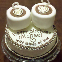 Latte Birthday Cake Birthday cake for my husband, used mini cakes covered in fondant for the lattes and gumpaste for the steam swirls. TFL!