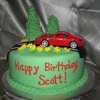 Scott's Porsche Cake Still practicing my technique with fondant here. My husband wanted a Porsche cake for his birthday. I said - are you nuts? I've only...